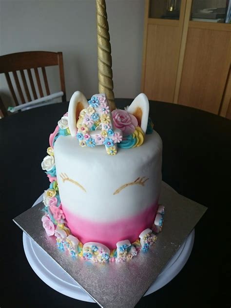 Unicorn Cake With Fondant Horn And Ears And Buttercream Swirls Complete With Fondant Roses