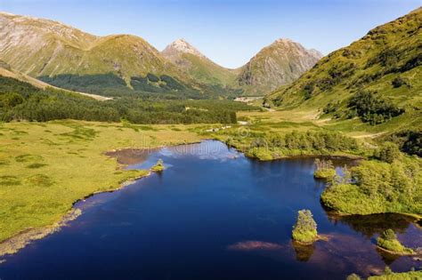 Aerial View Of Spectacular Alpine Scenery With Lochs And Mountains Glen