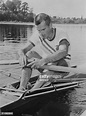 Downcast John B. Kelly, Jr., of Philadelphia, Pa., rests on his oars ...