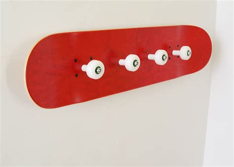 The New Skateboard Coat Rack Use Real Skate Wheels To Hang Up All Of