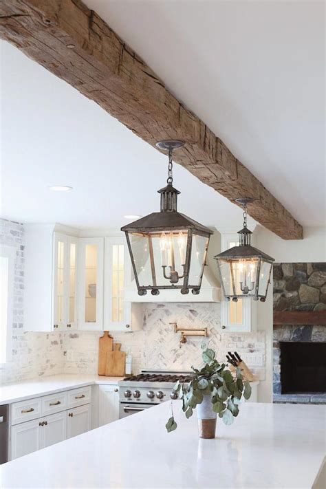 All White Kitchen With Reclaimed Wood Beam From Real Antique Wood