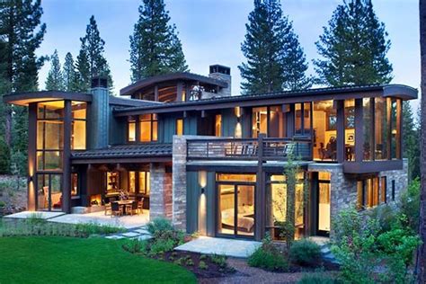 This beautiful home is up in the vermont mountains and it beautifully mixes the modern with the rustic, with expansive windows, lots of wood, and rock, and metal, lots of wildflowers to look at, and an open concept. Modern rustic home nestled high in the Sierra Mountains ...