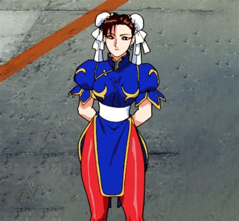 An Anime Character In Blue And Red Outfit Standing On The Ground With