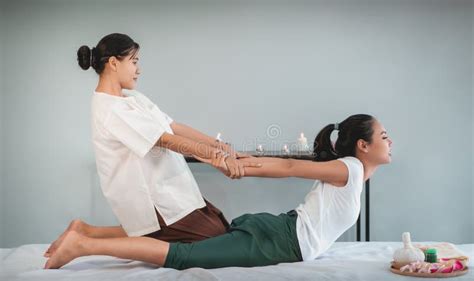 woman receiving back massage stretching in thai therapy spa treament stock image image of lady