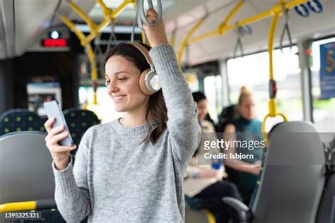 Woman Bus Headphones Photos And Premium High Res Pictures Getty Images