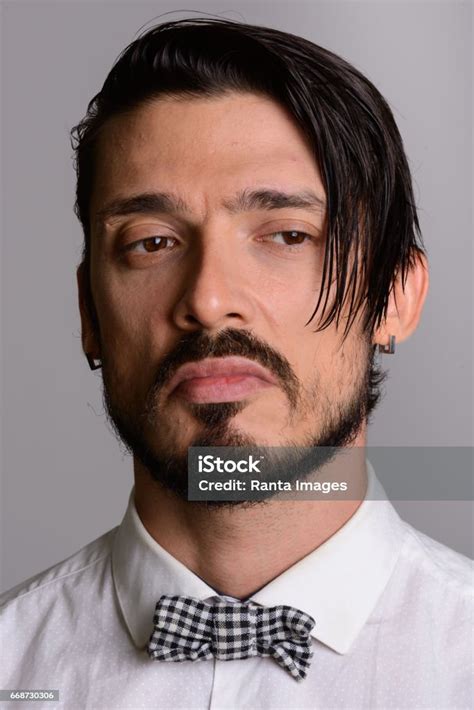 Face Of Angry Handsome Man Looking Down Stock Photo Download Image