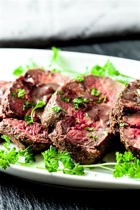 Searing the beef tenderloin roast in a skillet gives a lovely browned appearance to the meat and seals in the flavorful juices. Beef Tenderloin Roast with Red Wine Sauce - Chew Out Loud ...