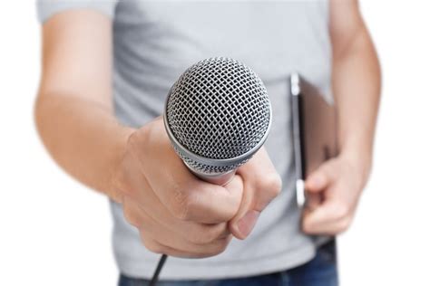 Shutterstock261065645 Young Man Holding A Microphone Isolated On