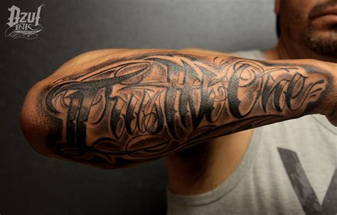 Trust No One Tattoo On Arm