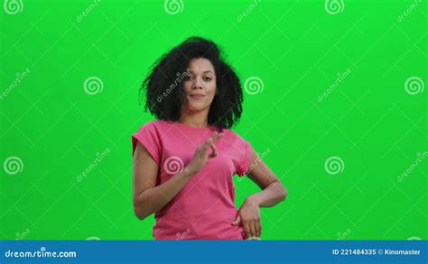 Portrait Of Young Female African American Smiling And Making Sign Ok