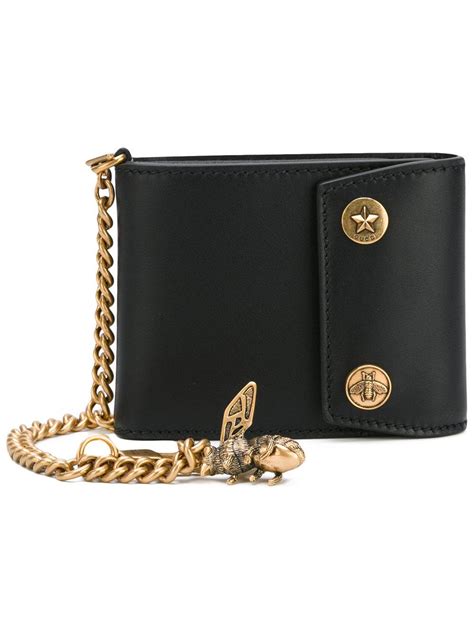 House codes and distinctive gucci symbols characterize men's wallets, card cases, money clips and pouches crafted in gg supreme canvas. Gucci Chain And Bee Wallet in Black for Men - Lyst