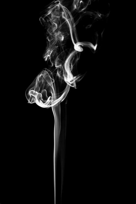 White Smoke Effect On A Black Background Free Image By