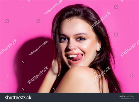 Стоковая фотография 1928101439 Sexy Girl Showing Tongue Woman Emotions Shutterstock