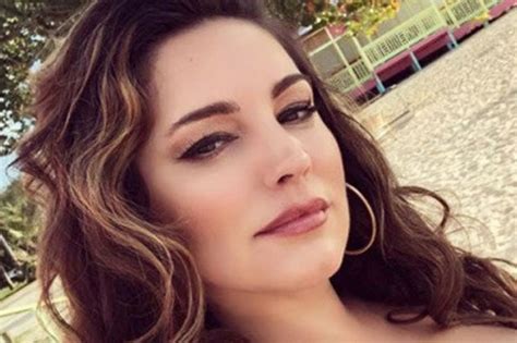 Kelly Brook Unleashes Curves In Sizzling Booty Skimming Ensemble