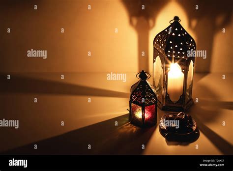 Ornamental Arabic Lanterns Burning Candles Glowing At Night Plate