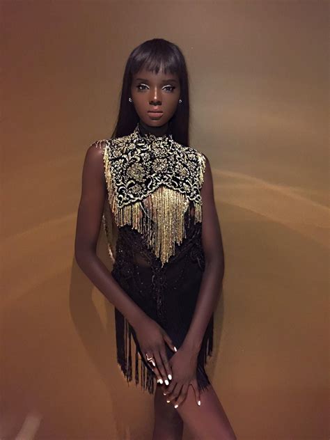 this model duckie thot looks like a real life barbie doll beautiful black women black