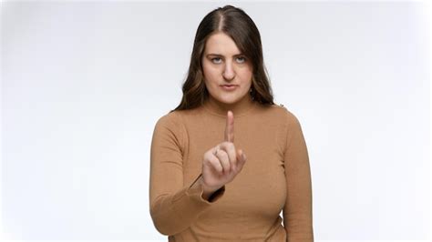 Premium Photo Portrait Of Serious Woman Shaking Finger And Saying No