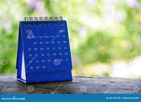 April 2024 Blue Table Calendar With Customizable Space For Text Copy