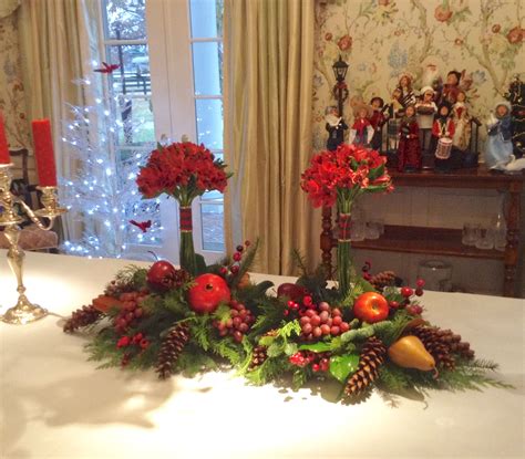 Christmas Centerpiece With Evergreens And Fruit By Nancy At Belton