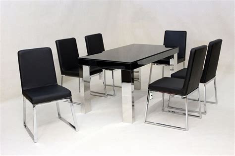 Find the dining room table and chair set that fits both your lifestyle and budget. Modern black glass dining table and 6 chairs - Homegenies