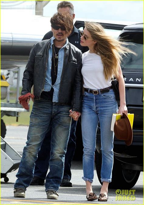 Johnny Depp And Amber Heard Hold Hands For Australian Arrival Johnny