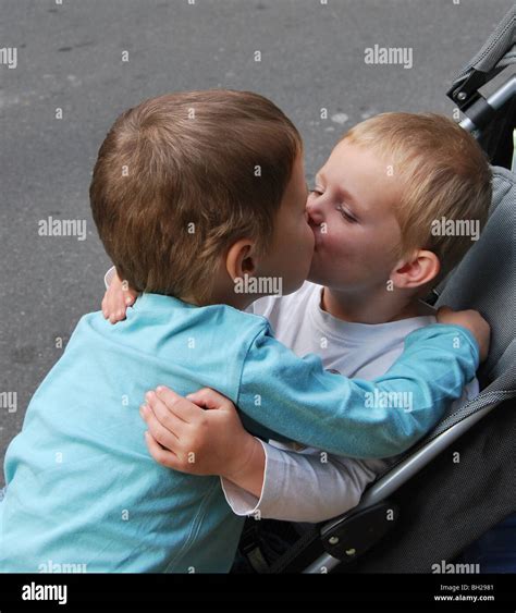 Brotherly Love Brothers Sharing A Kiss Stock Photo Alamy