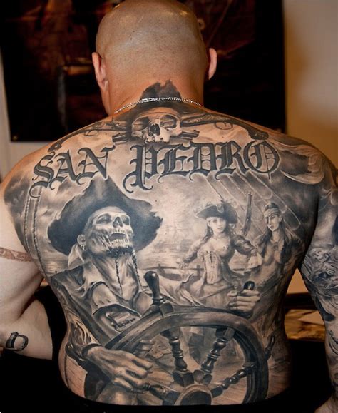 Captain america sheild with marijuana leaves tattoo on sleeve. Pirate Tattoos