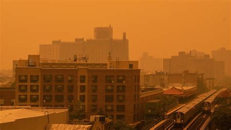 See Eerie Orange Skies Over New York City As Canadian Wildfire Smoke