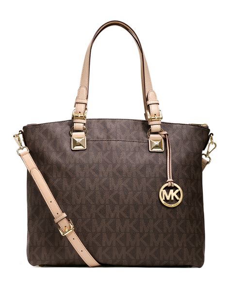 Lyst Michael Michael Kors Jet Set Logo Multifunction Tote In Brown