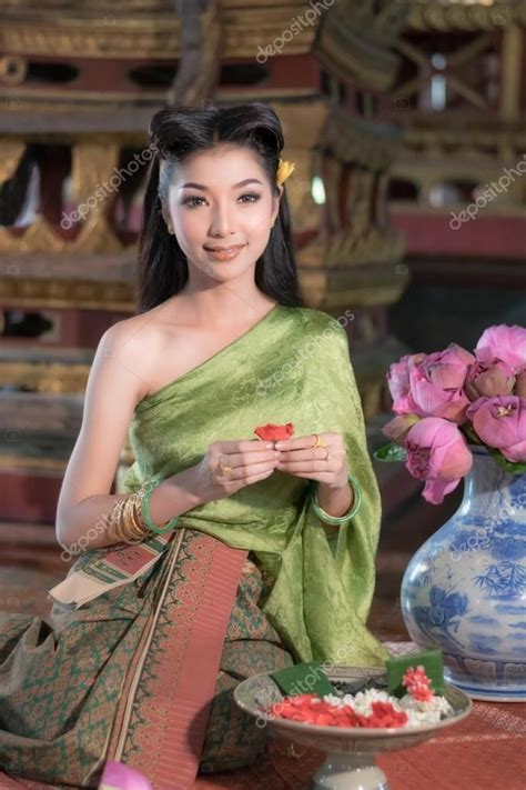 Women In Thai Traditional Dress At The Old Temple In Ayutthaya