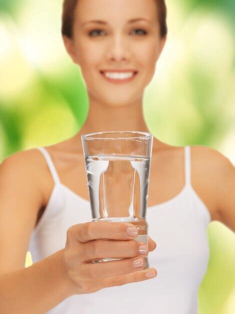 Premium Photo Closeup Picture Of Woman Hands Holding Glass Of Water
