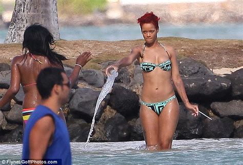 Rihannas Got A Gun Bikini Clad Singer Shows Off Shocking New Pistol Tattoo On Her Thigh