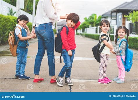 Back To School Students Mother Group Going School Together Pare Stock