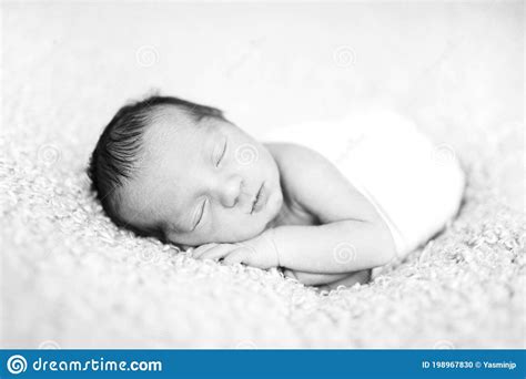 Newborn Baby Sleeping On Wool Blanket Happy Baby In Wrap Sleep Time