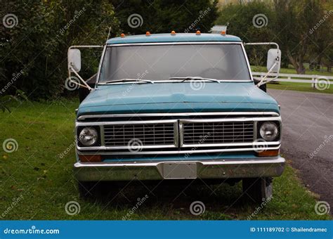 Blue Truck Parked On Road Side On The Grass Stock Photo Image Of