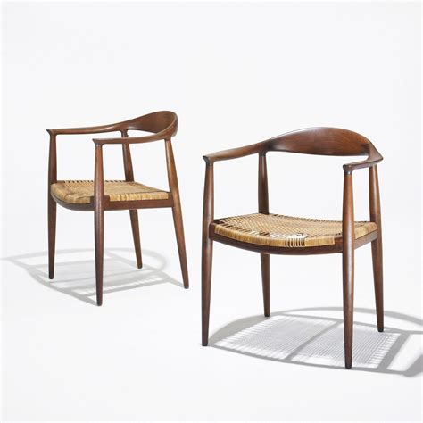 The chair best represents wegner's design philosophy of continuous purification.to cut down to the simplest possible elements of four. Hans Wegner The Chair, pair