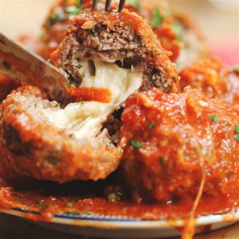 Easy Slow Cooker Mozzarella Stuffed Meatballs And Sauce Recipe By Maklano