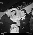 Concert violinist Isaac Stern kisses Toby Friedlander, bride of Israeli ...