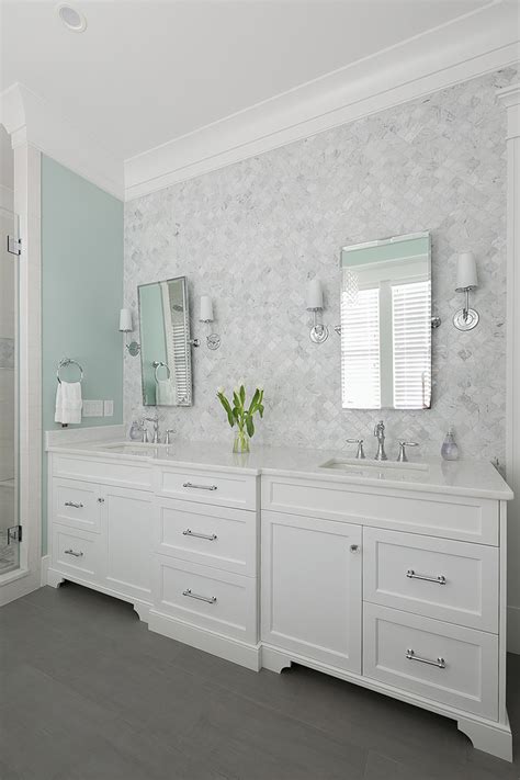 Try mixing different tiles shapes and sizes to add further. Savvy Southern Style : Tiled Vanity Walls