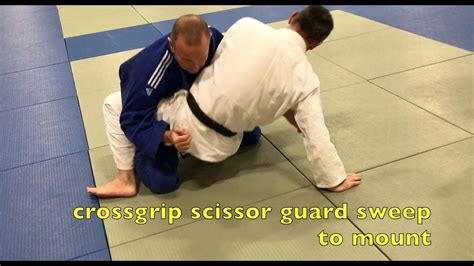 Cross Grip Scissor Guard Sit Up Sweep To Mount Youtube