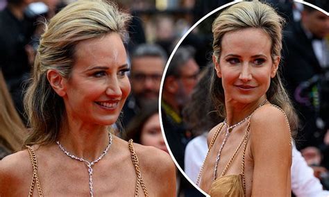 braless lady victoria hervey 45 suffers a wardrobe malfunction in a very racy cut out gown