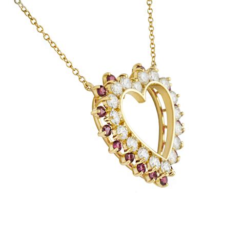 18k Yellow Gold Ruby And Diamond Heart Necklace Rich Diamonds