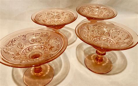 four antique pink depression glass doric and pansy pa