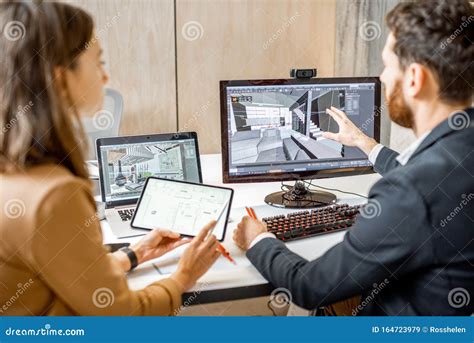 Two Interior Designers Working In The Office Stock Image Image Of