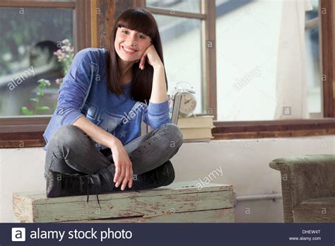 Word Usage Is It Idiomatic She Is Sitting With Her Hand Hands