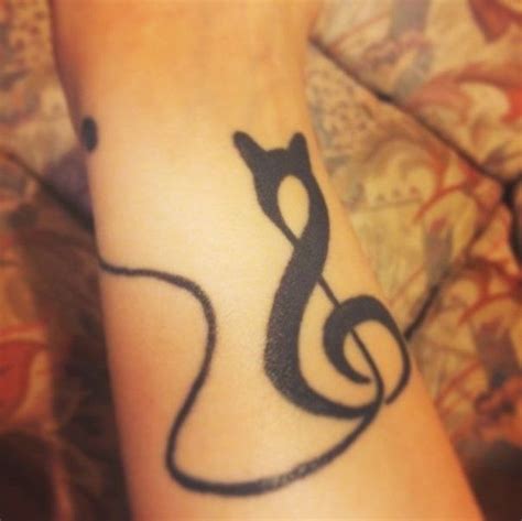 cat tattoos have been one of the favorite among tattoo designs for a long time now primarily