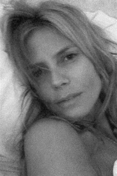 Heidi Klum lounging in bed on Sept. 17, 2014. Instagram -Cosmopolitan