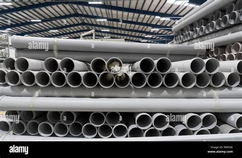 Stack Of Pvc Pipes Inside A Factory Stock Photo Alamy