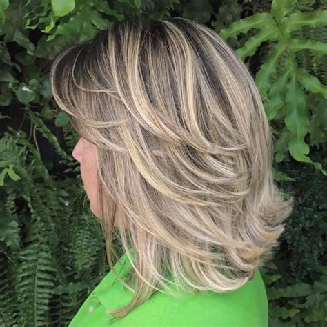 Haircuts with short backs and sides are clean, presentable, and most importantly, allow you to add shape to your hairstyle in a way that product can't. 20 Best Collection of Flipped Lob Hairstyles With Swoopy ...