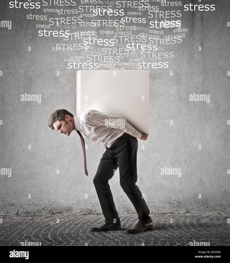 Businessman Carrying Heavy Weight Stock Photo Alamy
